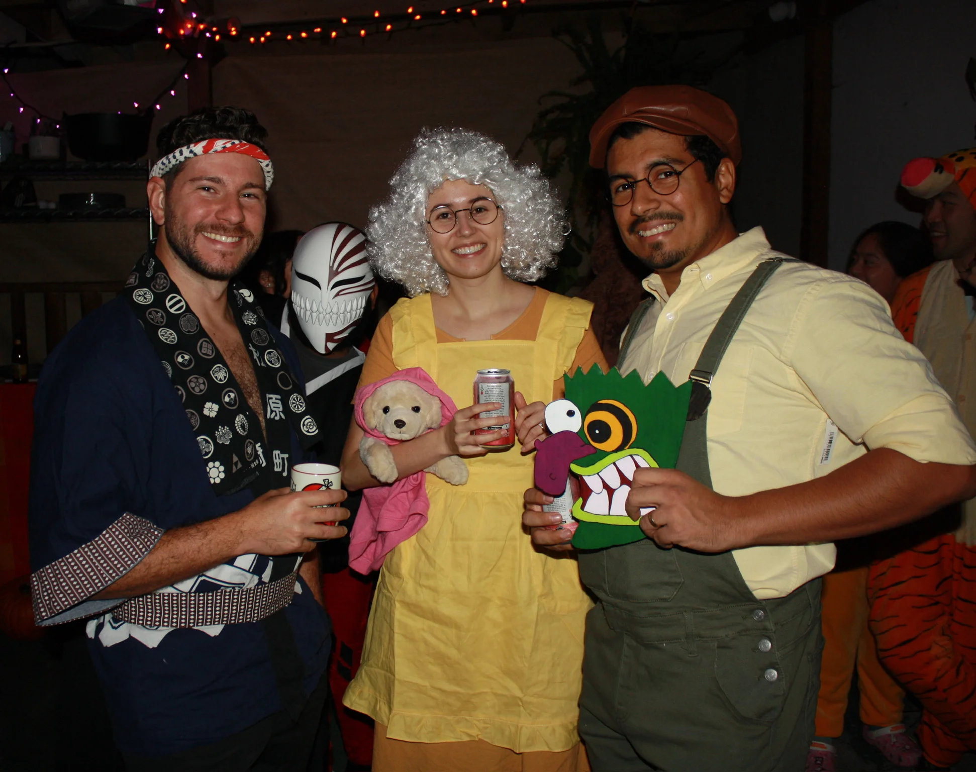 Four friends showing their Halloween costumes